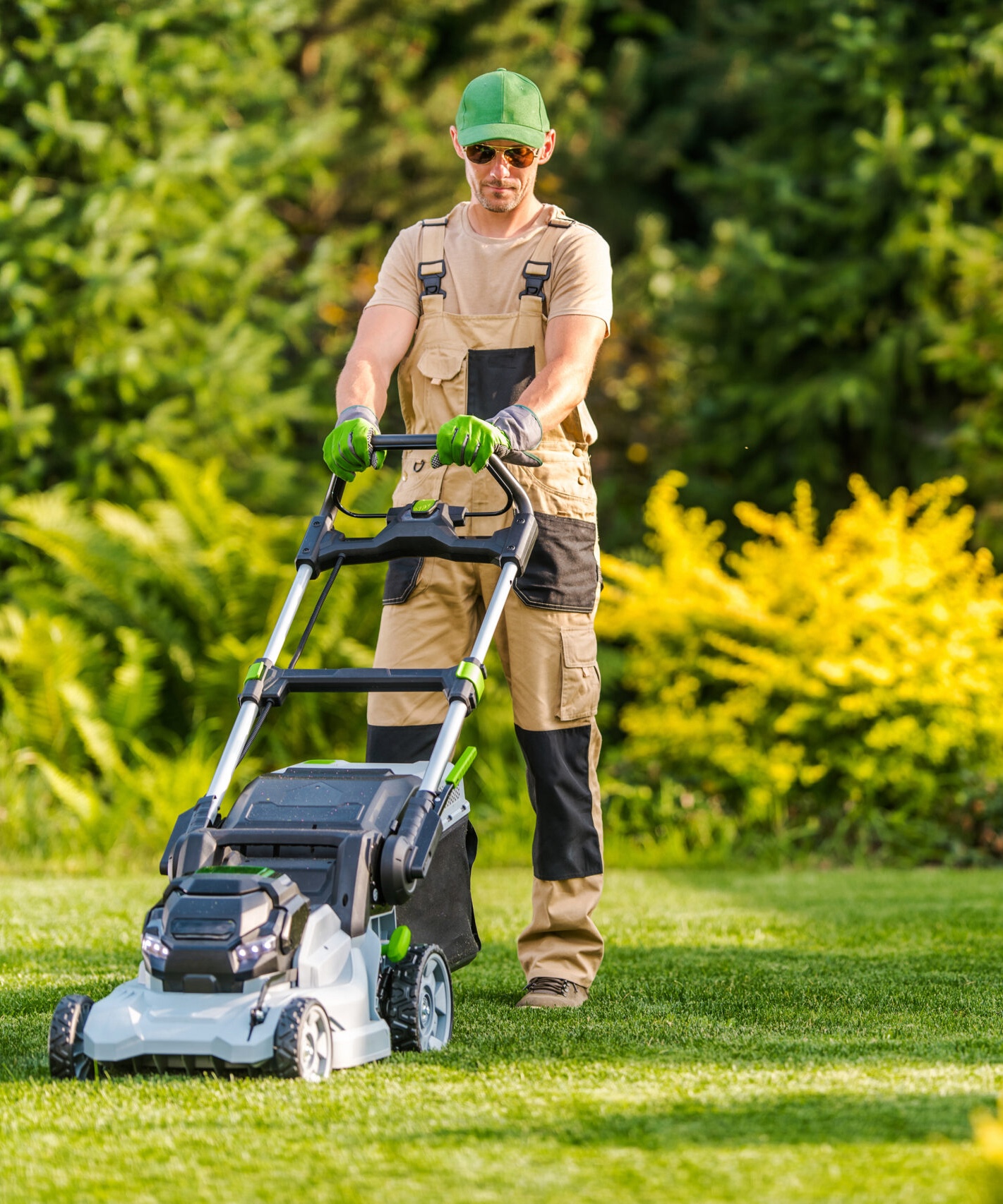 Professional lawn care service mowing grass for a residential property in Niagara Falls